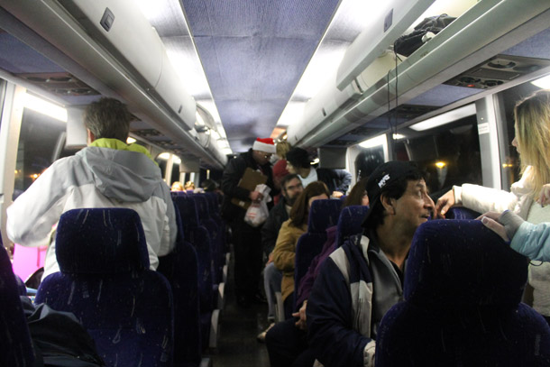 Sandy victims board a bus that will take them to Washington D.C. where they will push for Sandy aid. (Rashed Mian/Long Island Press)