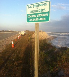 A chunk of a newly rebuilt dune protecting Ocean Parkway eroded over the weekend.