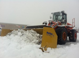 Snow plow clearing the streets during another winter storm that hit LI. (Timothy Bolger/Long Island Press)
