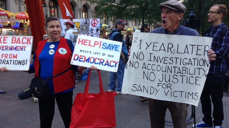 Occupy Wall Street protestor Bill Johnson lashes out about income inequality, homelessness and sub-par Superstorm Sandy recovery efforts outside Zuccotti Park in Lower Manhattan Sept. 17, 2014 during the global protest movement's third anniversary. (Christopher Twarowski/Long Island Press)