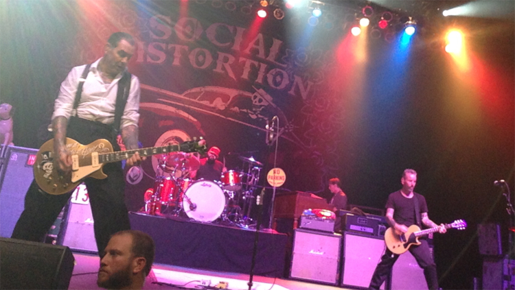 Social Distortion frontman Mike Ness and guitarist Jonny “2 Bags” Wickersham disembowel their Les Pauls during a leviling performance at The Paramount in Huntington, NY Friday, Sept. 5, 2014. (Christopher Twarowski/Long Island Press)