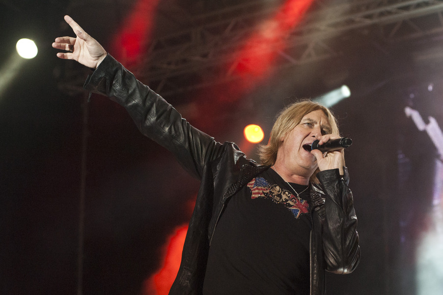 BARCELONA, SPAIN - JUNE 24: Joe Elliott of Def Leppard performs on stage at Poble Espanyol on June 24, 2013 in Barcelona, Spain. (Photo by Jordi Vidal/Redferns via Getty Images)
