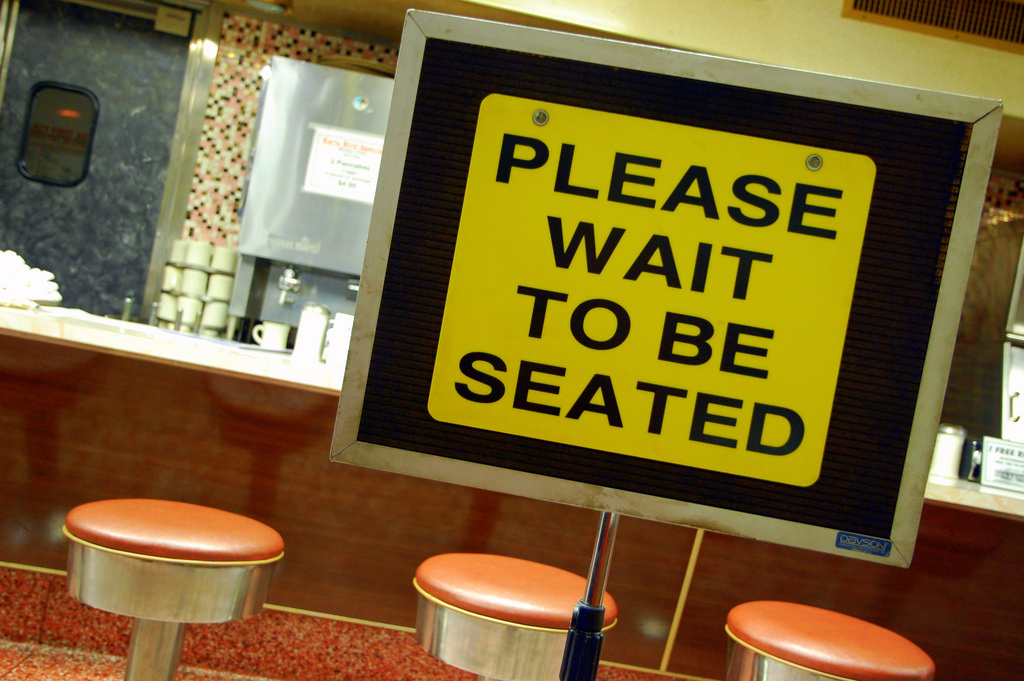 please wait