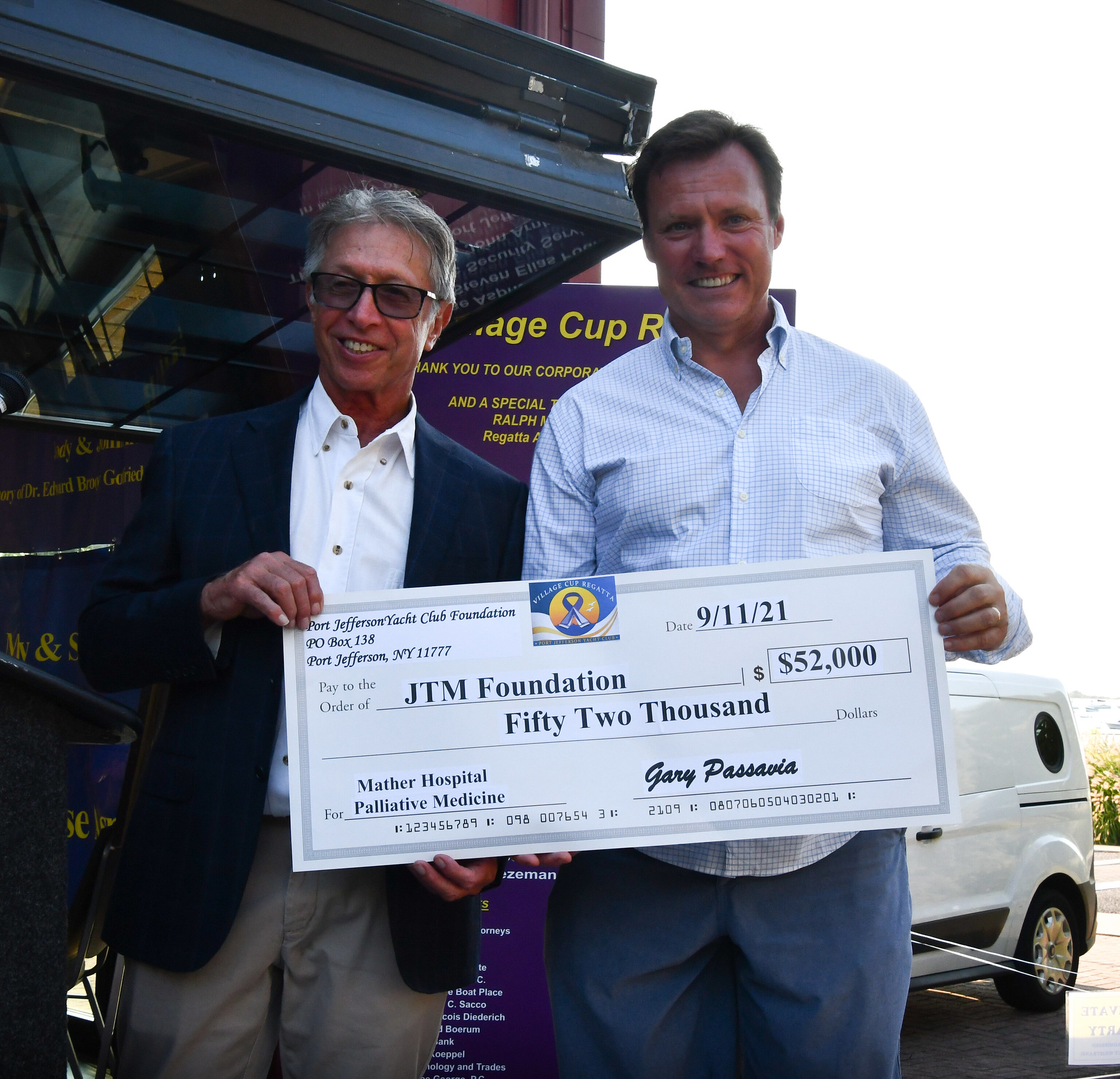 Image 12 Gary Passavia presenting a check to Mather Hospital Executive Director Kevin McGeachy