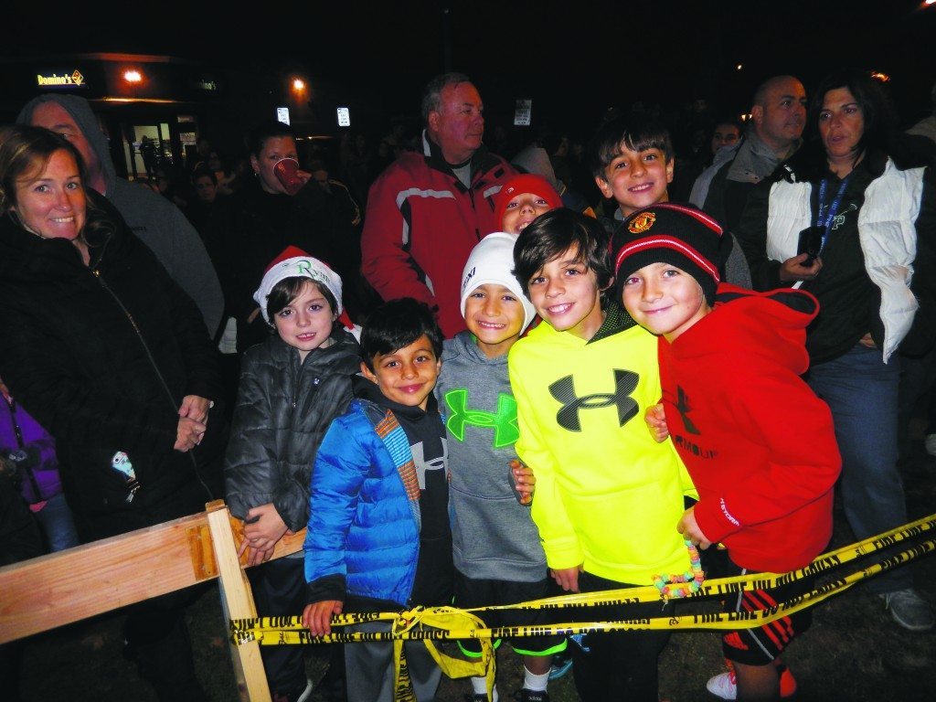 Friends got together at the tree lighting ceremony.