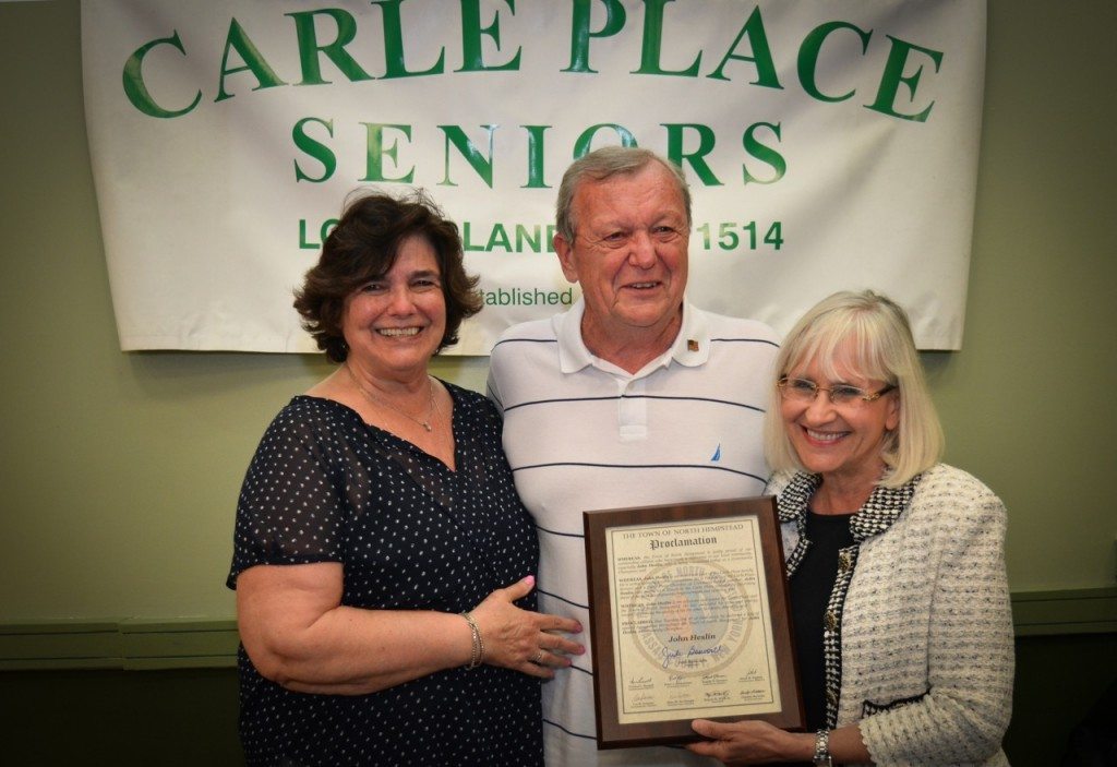 Barbara Heslin, John Heslin, and Supervisor Judi Bosworth