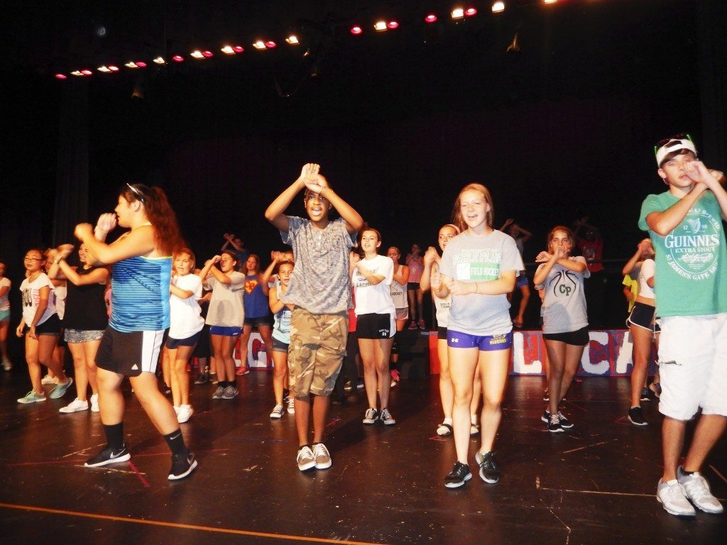 Students practice a dance number during a recent rehearsal.