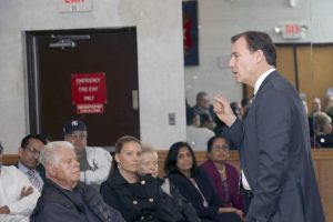 Tom Suozzi makes a point during his May 4 town hall meeting at the VFW William M. Gouse Jr. Post 3211 in Hicksville. Sitting at lower left is Henry Porzio of Hicksville, who said he has closely studied the workings of congress for the past eight years and urged Suozzi to go to Washington and “get things done.” (Photo by Frank Rizzo)