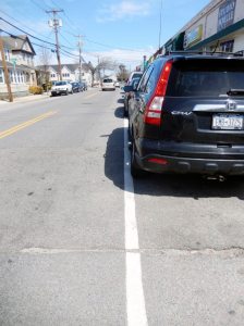 The county is considering eliminating south side parking on Westbury Avenue