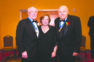 John R. Dunne (far left) with former Floral Park Mayor Ann Corbett and Bill Corbett