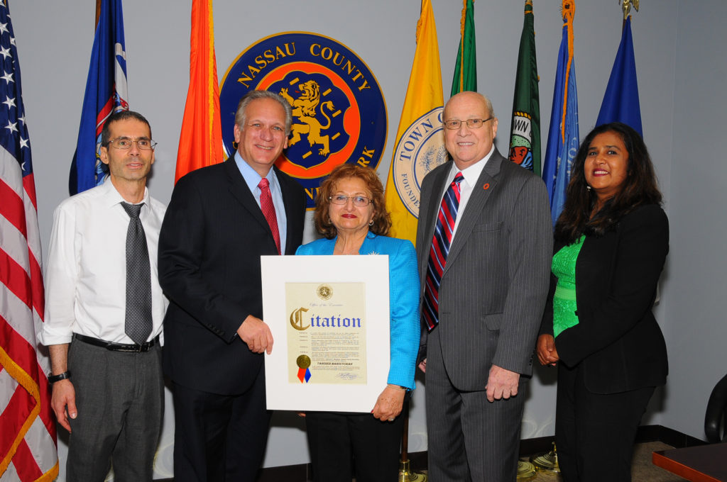 Pictured above from left to right: Scott Vodvarka, Social Services Examiner Supervisor I; County Executive Edward P. Mangano; Honoree Tina Mahoutchian, Social Services Examiner II; John Imhof, Commissioner, Department of Social Services; Sunita Manjrekar, Director of Employment Programs