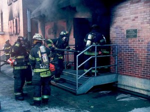 Stewart Manor Fire Department getting ready to enter a smoke-filled structure during a drill.