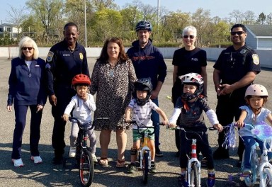 A Bicycle Rodeo, Helmet Safety, and Story Time event at Manorhaven Beach Park on April 24 taught children about bike safety.