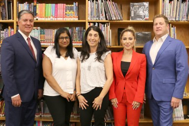 The 2024-2025 Jericho Board of Education. President Dr. Christopher Foresto (Far L.) is not running for re-election
