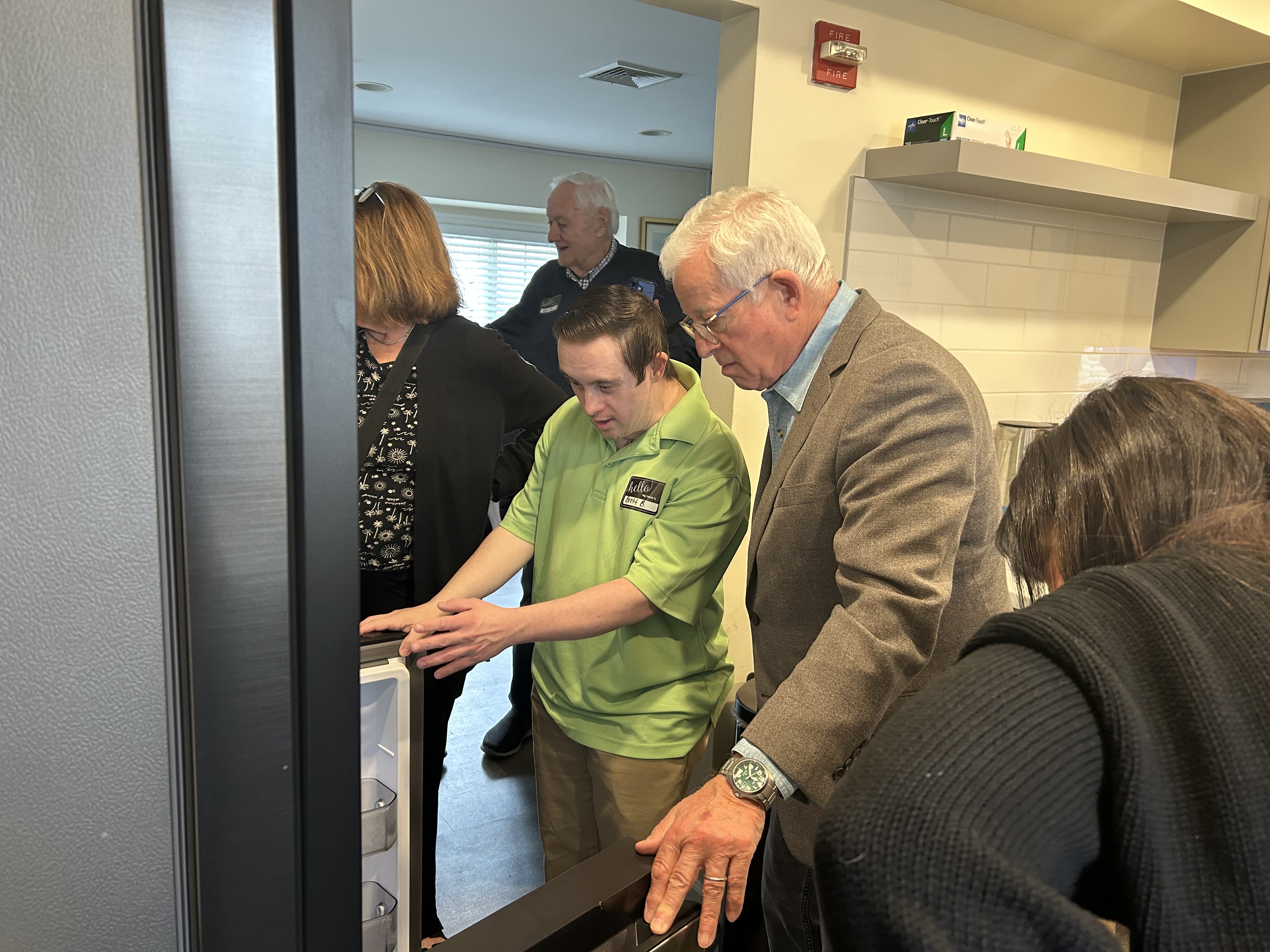 Life's WORC Westbury group home resident Bran B. (left) giving a tour to NYS Assemblyman Charles D. Lavine (D-Glen Cove)
