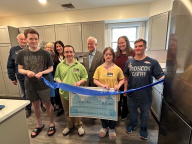 Life's WORC Board member Ed O'Donnell and his wife, Anne, with Board member Dawn Del Mastro-Chruma, joined by Westbury group home residents Brett B., Megan B. and Brian S. Also, NYS Assemblyman Charles D. Lavine and Andrea DiVita.