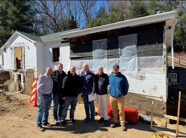 Nicholas Cianciotti, Island Engineering PLLC; Tom Granato, JGM-NY Construction; Mike Franco, Studio 287 Architecture; John Comack, JGM-NY Construction; Elliot Conway, Mayor of Upper Brookville; Matt Comack, JGM-NY Construction and Project Manager (L. to R.) in front of the current building at 5701 Northern Boulevard
