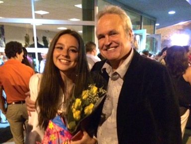 Alexandra "Sandy" Durst (L.) and her father, John Durst (R.) at her graduation from Syosset High School in 2016, holding a diploma that has since been returned by Tom Kelly.
