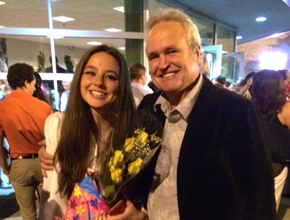 Alexandra "Sandy" Durst (L.) and her father, John Durst (R.) at her graduation from Syosset High School in 2016, holding a diploma that has since been returned by Tom Kelly.