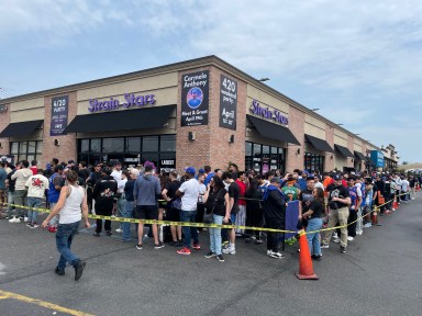 Fans of Carmelo Anthony waited outside as he held an event at Strain Stars in Farmingdale for his cannabis products now available in New York