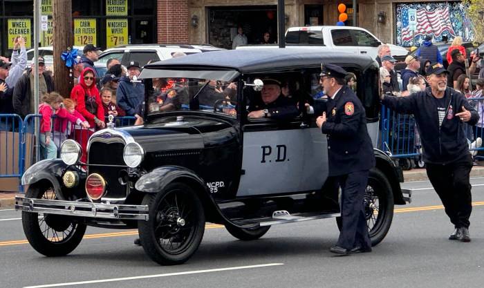 Vehicles from the Nassau County Police Department's history, inlcuding a 1928 Model A drove down the parade route.