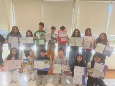 Wheatley students stand with certificates.