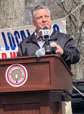 Local 1049 Business Manager Pat Guidice speaking at a rally against National Grid