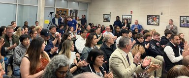 Packed crowd in Sewanhaka board room