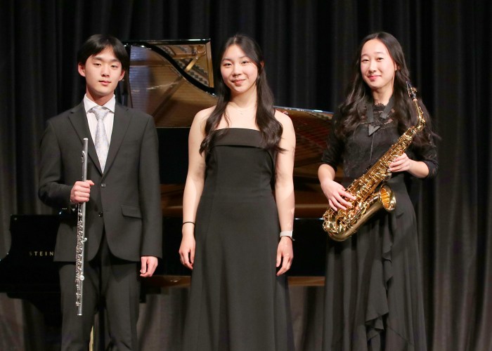 Great Neck South High ensemble Hugh Choi (L.), Sarah Sun (R.) and Selena Lu (Center) were selected for the third time.