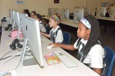 Students on Long Island faced multiple days of disruptions while taking New York State tests. Photo of students at St. Rose of Lima School in Massapequa.