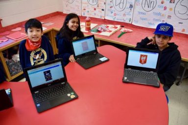 Garden City Park elementary schoolers working on projects.