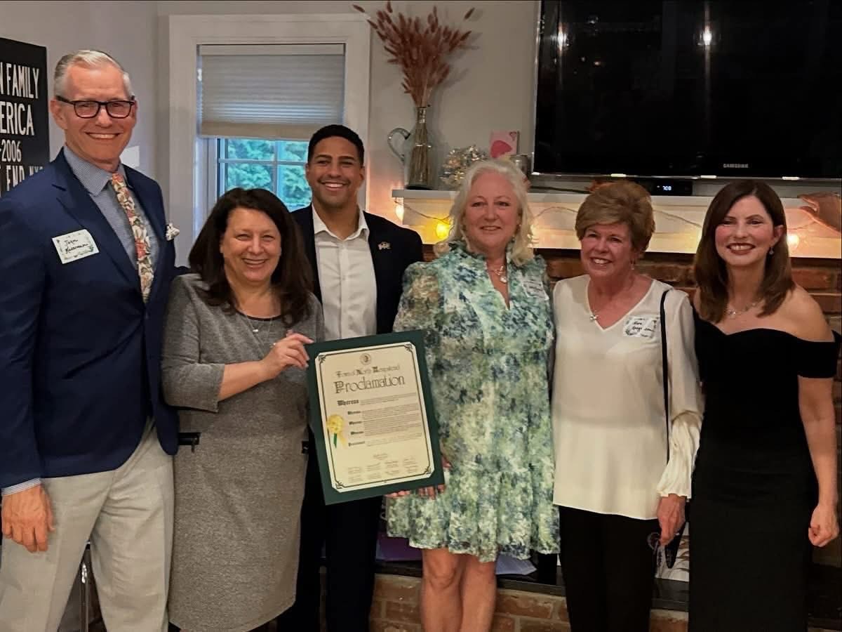 Public officials including Town of North Hempstead Council Member Mariann Dalimonte and Baxter Estates Mayor Nora Haagenson honored community leader Holly Byrne at the Baxter's Pond Foundation progressive dinner in early April.