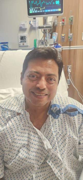 Sergio Cestoni in a hospital bed after his surgery at Northwell.