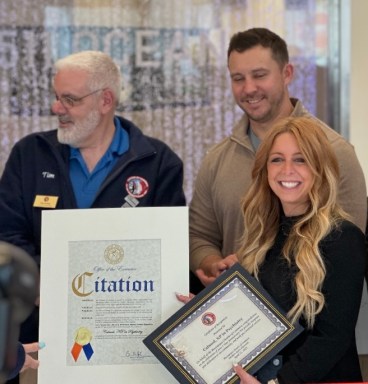 Jessica Loftus was given a citation as Calmed, NP in Psychology celebrated its one-year anniversary with a ribbon cutting on Friday, April 11