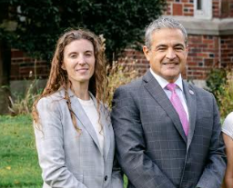 Superintendent Francesco Ianni (R.) congratulates Deputy Superintendent Maureen Raynor (L.) for receiving tenure at the Tuesday, April 22, Oyster Bay-East Norwich Board of Education meeting.