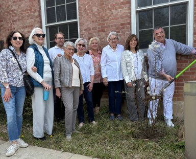 Sands Point Mayor Peter Forman and Sands Point Garden Club members planted a tree at village hall for arbor day.