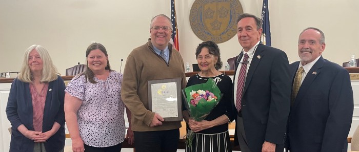 The Floral Park Board of Trustees presented Evelyn Schultz with a citation for her 42 years of service as receptionist in the administration department.