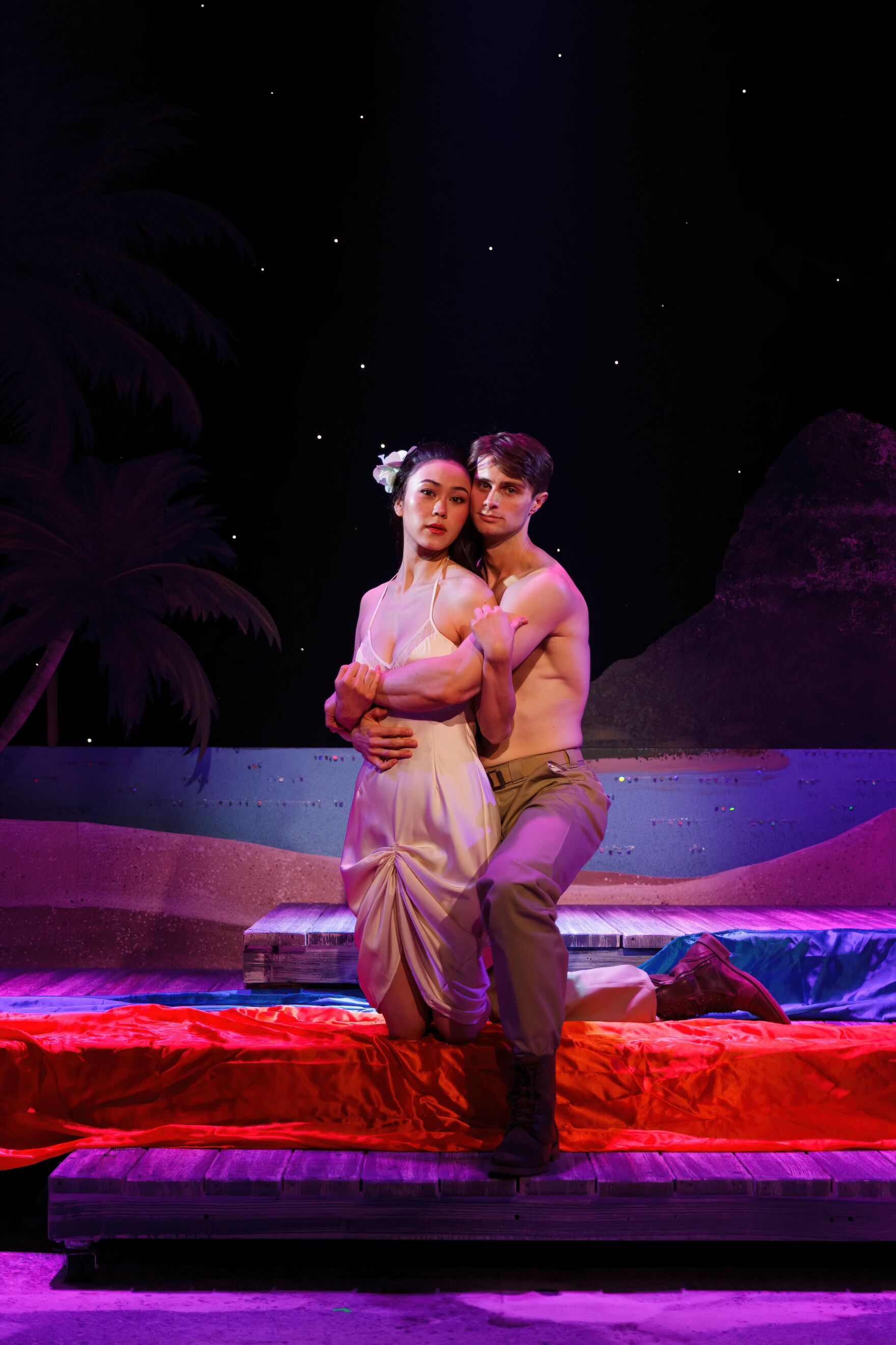 Alec Nevin as Lieutenant Joseph Cable and Malia Munley as Liat in South Pacific create some gorgeous and passionate tableaus together on the Engeman Theater stage.