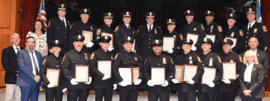 Port Washington Police District Commissioners and top brass honor 20 officers for their dedication to the Port Washington community.