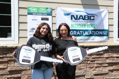 Roslyn mother, Melissa Romero, right, and her daughter received a fully refurbished car with help from Jericho Cares.