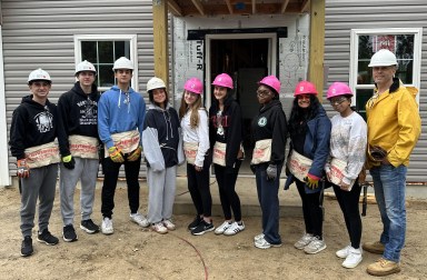 Roslyn High School's Habitat for Humanity Club spent a day volunteering at a construction site.