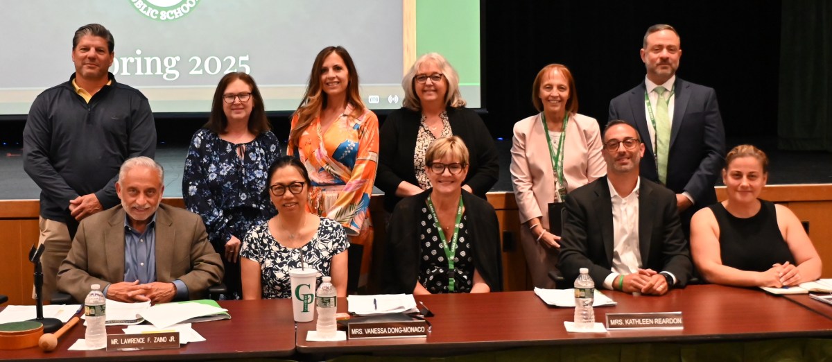 Carle Place's Board of Education awarded tenure to staff and honored retirees.