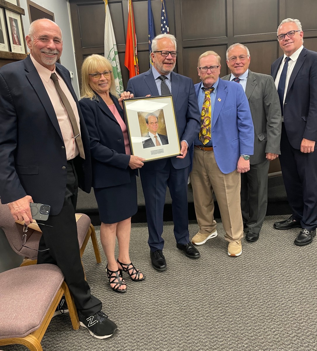 Former Farmingdale Mayor George Graf has his plaque added to 'Wall of Honor'