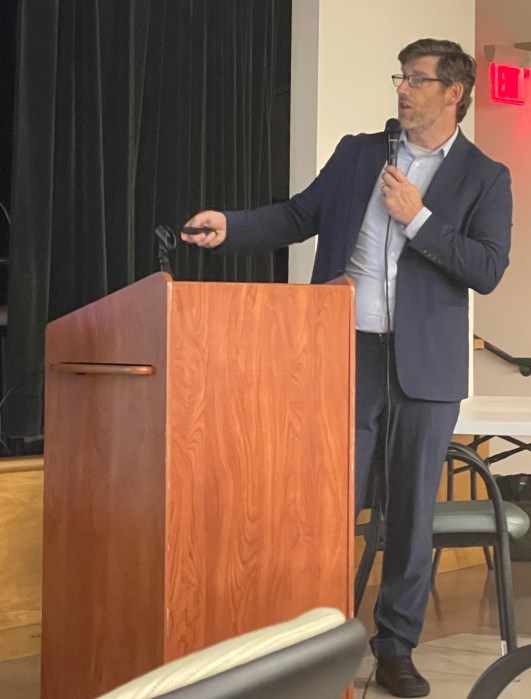 Noah Levine from BFJ Planning showed a presentation to a room full of Farmingdale residents.