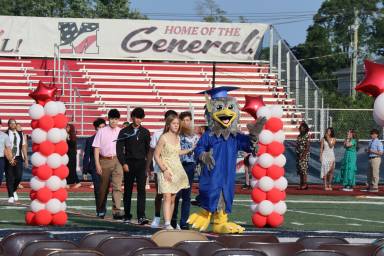 Jonas E. Salk Middle School’s eighth grade graduates processed onto the General Douglas MacArthur High School field during their moving up ceremony.