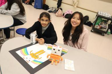 Levittown students united across schools as Division Avenue high schoolers visited Summit Lane third graders.