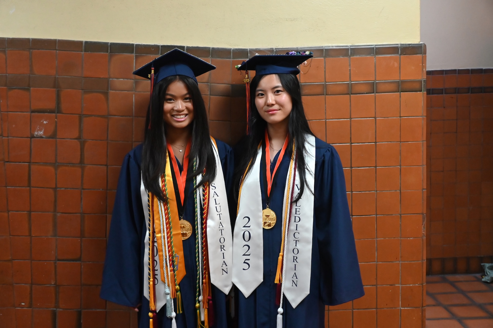Manhasset valedictorian Jule Mingxin Chen (R.) and salutatorian Grace Punzalan (L.).