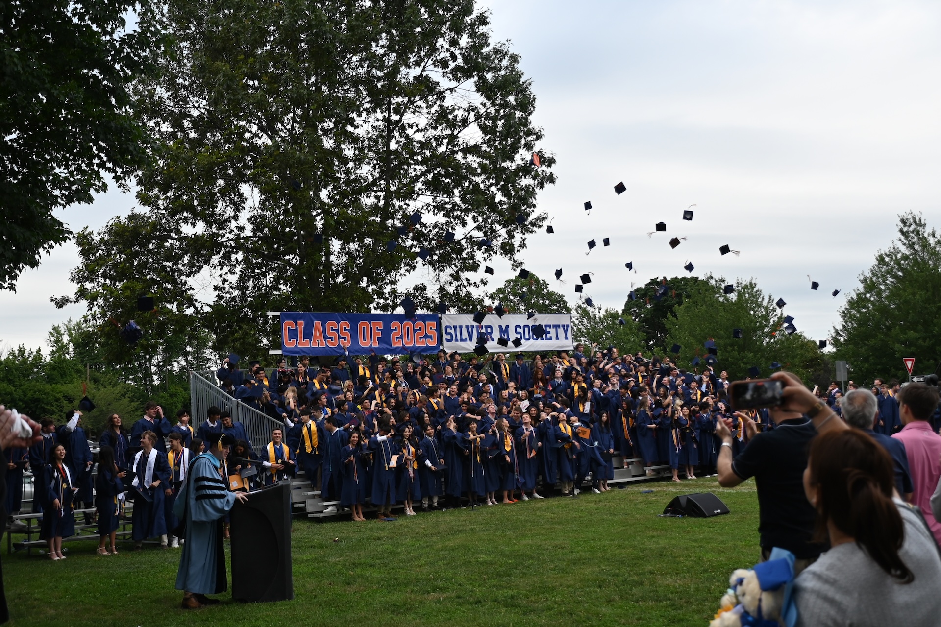 Seniors threw their caps into the air.