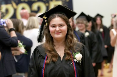 Village School graduating seniors walk in the 55th graduation ceremony.
