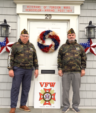 VFW Post 1819 reopened their recreation center for veterans, thanks to a donation by King Quality Roofing and Siding. Commander Robert Freeland (L.) and Trustee Jerry Tedeschi (R.).